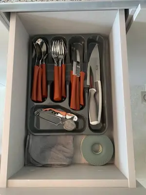 a drawer filled with utensils in a box at Loft Premium con Vista al Mar in Santa Marta
