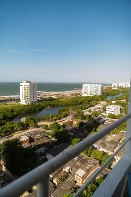 a view of a city with buildings and the ocean at Ocean Blue Apartment WiFI Beach Old Town in Cartagena de Indias