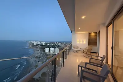 a balcony with chairs and a view of the ocean at Ocean View Loft Altamar in Cartagena de Indias