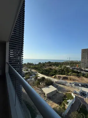 a view of the ocean from the balcony of a building at Santa Marina Caribbean Dreams in Santa Marta