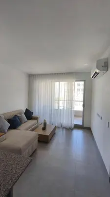 a living room with a couch and a table at Santa Marina Caribbean Dreams in Santa Marta