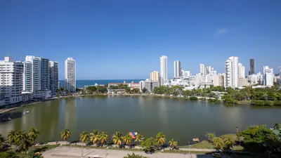 a large lake in front of a city at Riviera Mulata Loft - Apartamento con vista al mar in Cartagena de Indias