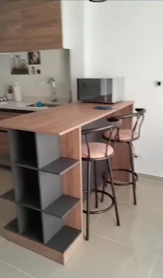 a kitchen with a desk with a computer on it at Apartamento en Torices in Cartagena de Indias