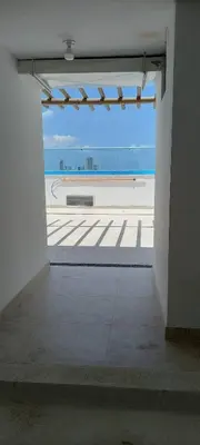 an empty room with a view of the ocean at Apartamento en Torices in Cartagena de Indias