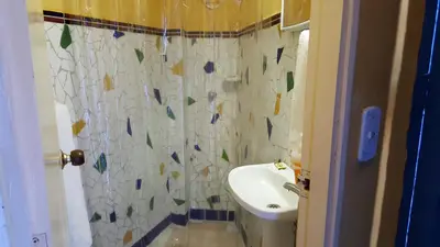 a bathroom with a toilet and a sink at Apto exclusivo Centro Historico in Cartagena de Indias