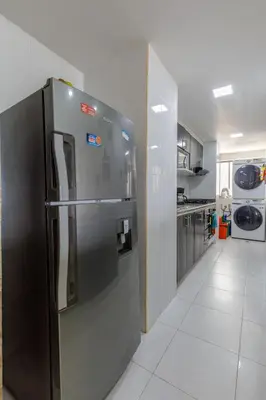 a large stainless steel refrigerator in a kitchen at Cartagena - Torremarina in Cartagena de Indias