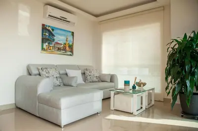 a living room with a couch and a table at Cartagena Beach Front in Cartagena de Indias