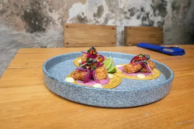 a plate of food on top of a table at Casa Be Getsemaní in Cartagena de Indias