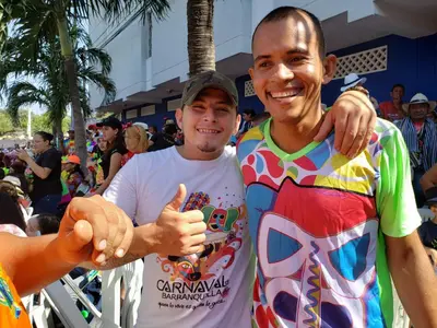 two men standing next to each other giving a thumbs up at Hotel Sandiego inc in Barranquilla