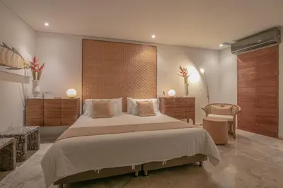a bedroom with a large bed in a room at Casa Claver Loft Boutique Hotel in Cartagena de Indias
