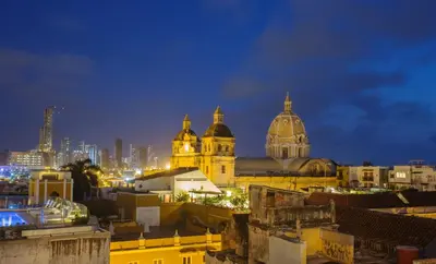 a view of a city skyline at night at Movich Hotel Cartagena de Indias in Cartagena de Indias