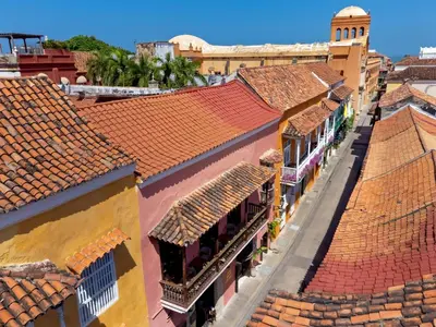 an aerial view of the roofs of buildings at El Marques Hotel Boutique By GEH Suites in Cartagena de Indias