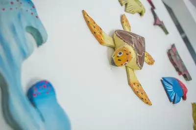 a close up of a toy airplane on a cake at Isla Grande Eco-Hostal in Isla Grande