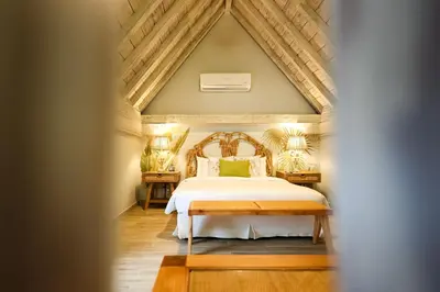 a bedroom with a bed and a wooden ceiling at Hotel Casa Canabal by Faranda Boutique in Cartagena de Indias