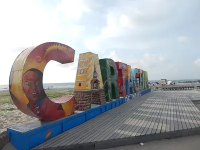 a row of colorfululptures on the beach at Edificio Morros Vitri in Cartagena de Indias