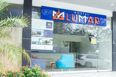 a store front with a sign for aldiological lamar at Hostal Lumar in Barranquilla