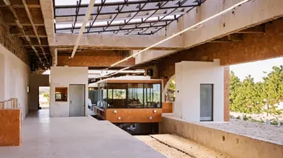 an empty building with a train on the tracks at Apartamentos Oceana - Cerca al Buenavista by SOHO in Barranquilla