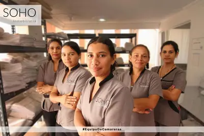 a group of women standing in a room at Apartamentos Oceana - Cerca al Buenavista by SOHO in Barranquilla