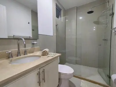 a bathroom with a toilet and a sink and a shower at Morros Epic in Cartagena de Indias