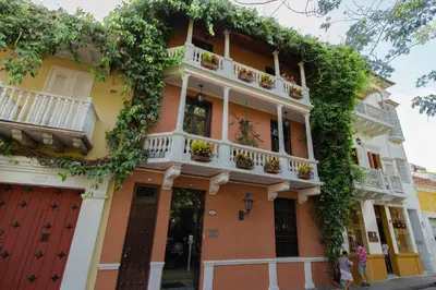 a building with plants on the side of it at Hotel Casa La Fe in Cartagena de Indias