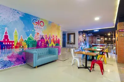 a restaurant with a colorful mural on the wall at GIO hotel Tama Cartagena in Cartagena de Indias