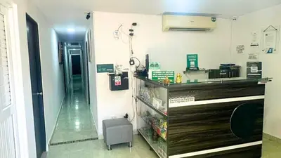 a room with a pharmacy with a pharmacyacistacistacistacist at Hotel Casa Paraiso in Barranquilla