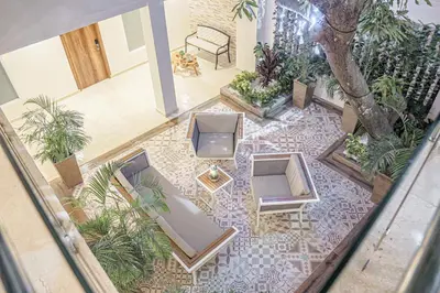 an overhead view of a lobby with chairs and plants at Cartagena Royal Hotel Boutique in Cartagena de Indias