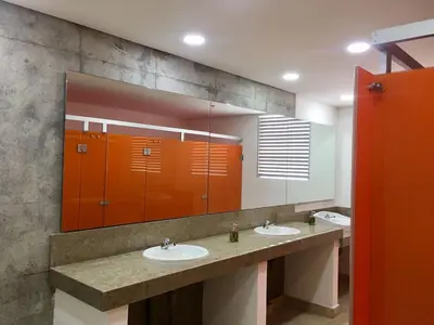 a bathroom with two sinks and a large mirror at Luxury Infinitum in Cartagena de Indias