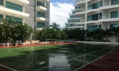 a swimming pool in front of a building at Apartamento seaway 935 Morros, La Boquilla in Cartagena de Indias