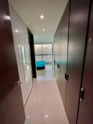a hallway of a room with a view of the ocean at Beach front Apartament in Cartagena de Indias