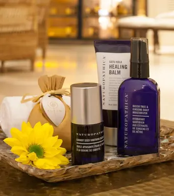 a tray with products on a table with a flower at Hotel Casa San Agustin in Cartagena de Indias