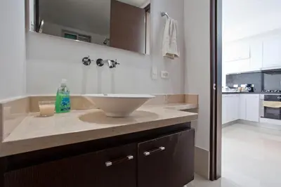 a bathroom with a white sink in a room at Palmetto Eliptic 4003 in Cartagena de Indias