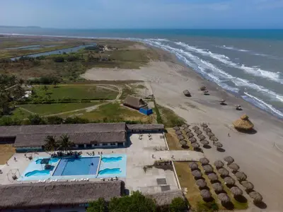 an aerial view of a resort and the beach at Hotel Arena Beach Cartagena in Cartagena de Indias