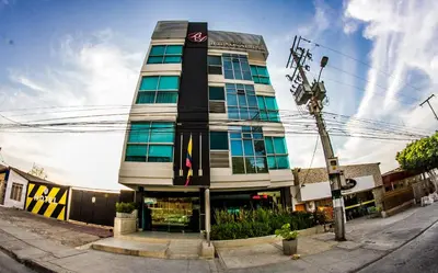 a tall building on the corner of a street at Hotel Buenos Aires in Cartagena de Indias