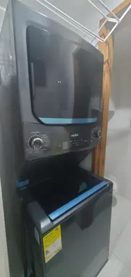 a television sitting on top of a black box at Apartamento en cartagena Boquilla vista al mar dos Hab in Cartagena de Indias