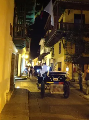 a man in a car on a street at night at Alojamiento con Vista Y Salida al Mar in Cartagena de Indias