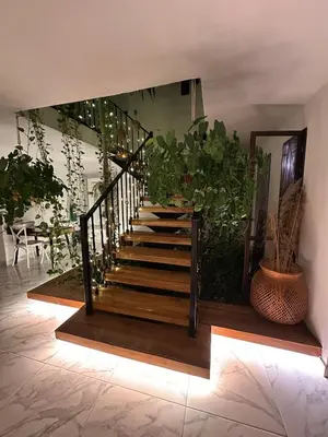a staircase in a house with potted plants at Le MARIE B&B in Cartagena de Indias