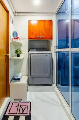 an rv with a tv and a window at Casa Rachel in Cartagena de Indias