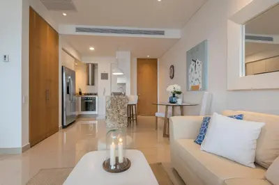 a living room with a couch and a table at Classy 1 BR, Pool, Gym near Downtown Cartagena by Huespedia in Cartagena de Indias