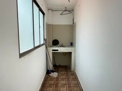 a hallway with a sink and a window at Apartamento la Isla 1-Coveñas in Coveñas