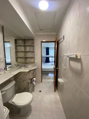 a bathroom with a toilet and a sink and a shower at Hotel Blue Diamond House in Cartagena de Indias