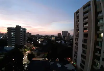 a view of a city at sunset from a building at Brand New - Prime Location For All Budgets - Executive & Luxury in Barranquilla