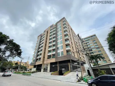 a tall building on the corner of a street at Brand New - Prime Location For All Budgets - Executive & Luxury in Barranquilla