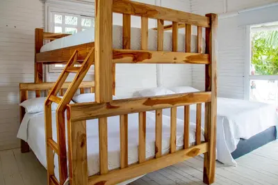 a couple of bunk beds in a room at Quinta del Mar La Joya in Tolú