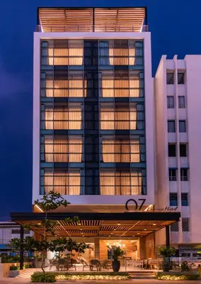 a tall building with a canopy in front of it at Oz Hotel Luxury in Cartagena de Indias