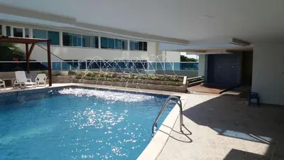 a swimming pool with a fountain in a building at Loft sea view 11C air and wifi in Cartagena de Indias