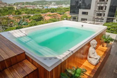 a swimming pool on the balcony of a building at Aparta estudio en el edificio bahia 79 apartasuites in Cartagena de Indias