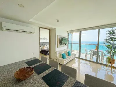 a living room with a view of the ocean at 31st Perfect Seaview Bocagrande Morros City in Cartagena de Indias