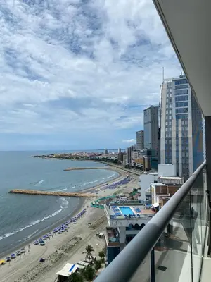 a view of a beach with buildings and the ocean at Apartamentos frente al mar en Morros City in Cartagena de Indias