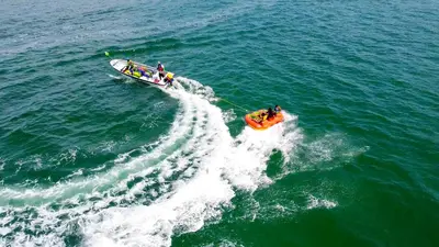 a group of people in a boat in the water at Marbelo Coveñas by Bernalo Hotels in Coveñas